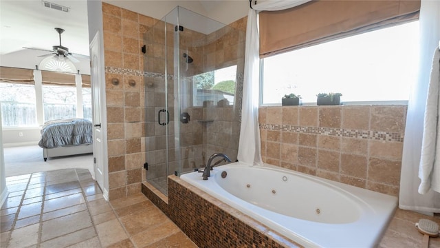 bathroom featuring plenty of natural light, shower with separate bathtub, and ceiling fan