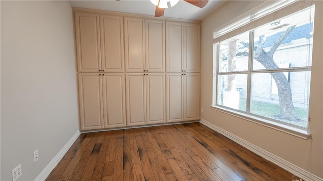 unfurnished bedroom featuring ceiling fan and light wood-type flooring