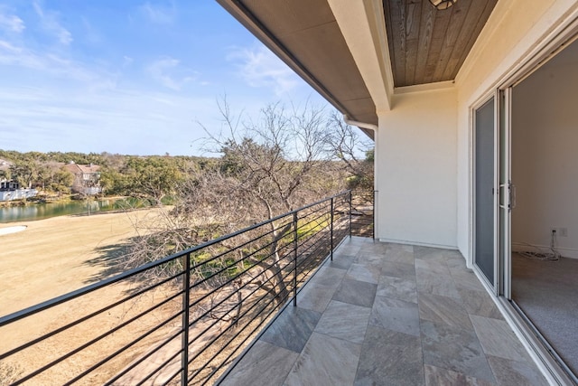 balcony featuring a water view