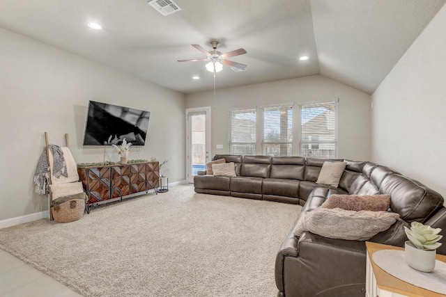 living room featuring ceiling fan, lofted ceiling, and carpet