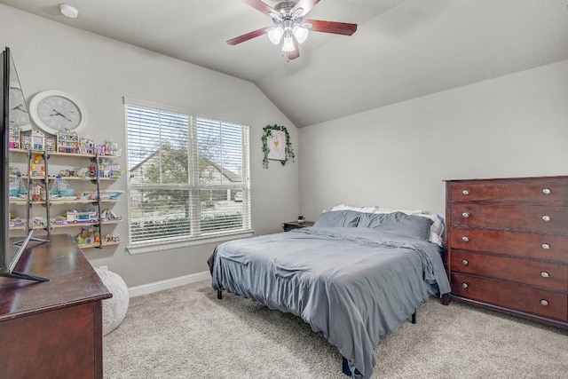 bedroom with light carpet, lofted ceiling, and ceiling fan