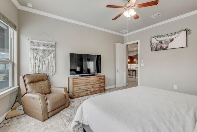 bedroom featuring light carpet, crown molding, and ceiling fan