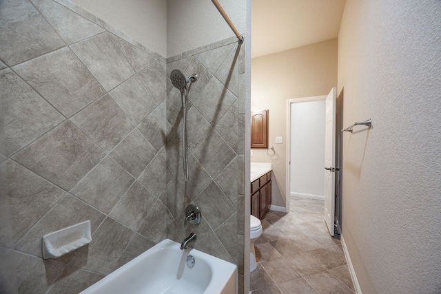 full bathroom with vanity, toilet, and tiled shower / bath