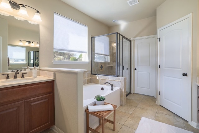 5025 Patagonia Pass, Austin, TX 78738 - full bath featuring a shower stall, vanity, a bath, and tile patterned flooring