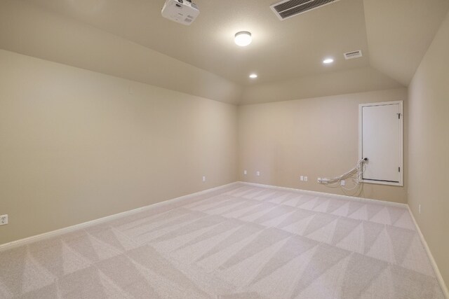 5025 Patagonia Pass, Austin, TX 78738 - empty room featuring light colored carpet, vaulted ceiling, and recessed lighting