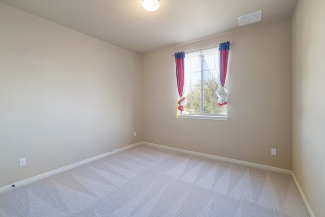 5025 Patagonia Pass, Austin, TX 78738 - spare room featuring light carpet and baseboards