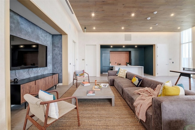 living room featuring a high ceiling