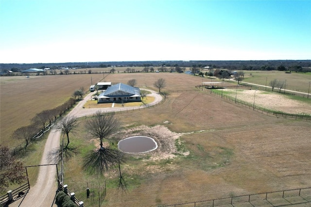 birds eye view of property featuring a rural view