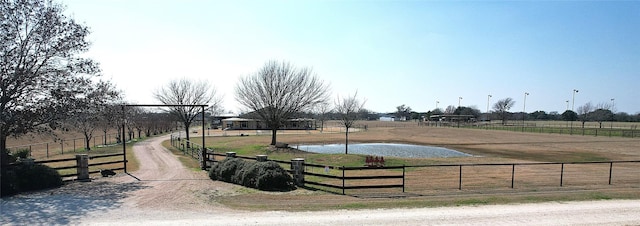 view of property's community featuring a water view and a rural view