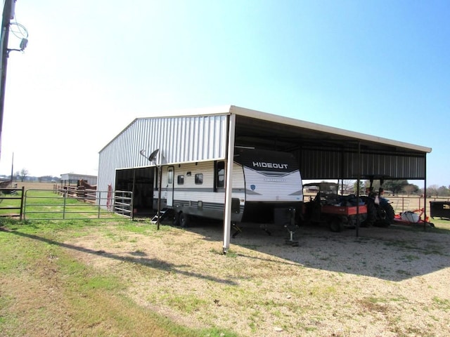 view of outbuilding with a rural view