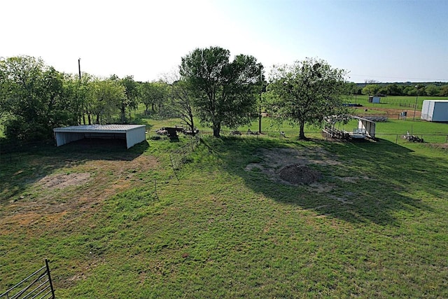 1361 Ropers Alley Rd, Belton, TX 76513 - view of yard featuring a pole building, an outbuilding, and a view of countryside