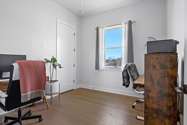 home office featuring hardwood / wood-style flooring