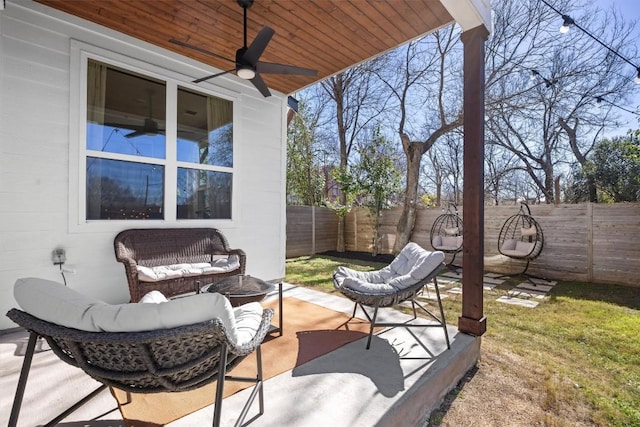 view of patio with ceiling fan