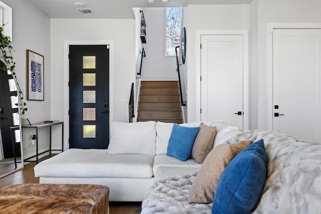 living room with dark hardwood / wood-style floors