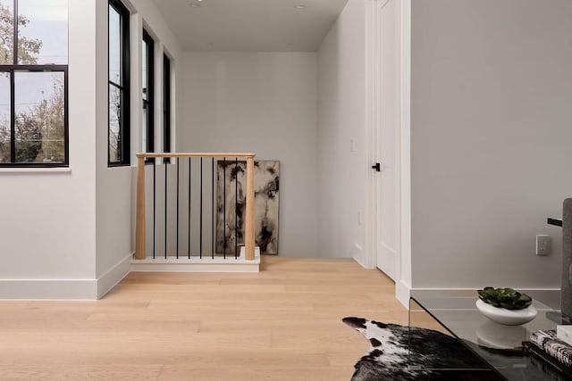 hallway with light wood-type flooring