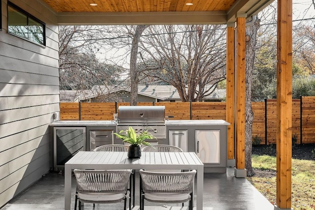 view of patio / terrace featuring grilling area and exterior kitchen