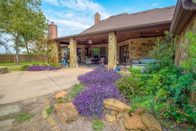 exterior space featuring a patio area and ceiling fan