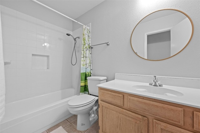 full bathroom featuring tile patterned flooring, vanity, toilet, and shower / bath combo with shower curtain