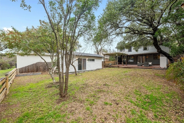 view of yard featuring a wooden deck