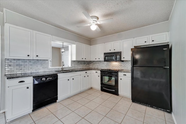 kitchen with sink, backsplash, white cabinets, ceiling fan, and black appliances