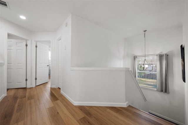 hall featuring wood-type flooring