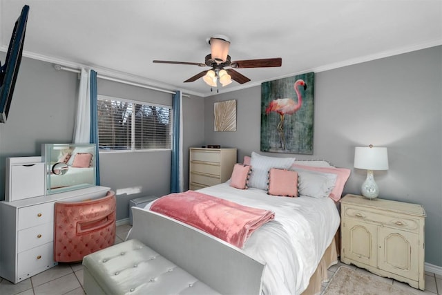 tiled bedroom featuring ceiling fan and ornamental molding