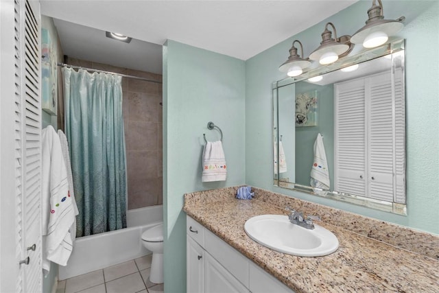 full bathroom with tile patterned floors, vanity, toilet, and shower / tub combo with curtain