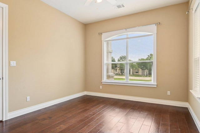 124 Abamillo Dr, Bastrop, TX 78602 - unfurnished room with dark wood-style floors and a ceiling fan