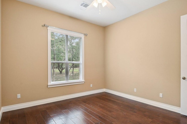 124 Abamillo Dr, Bastrop, TX 78602 - unfurnished room with a ceiling fan and dark wood-type flooring