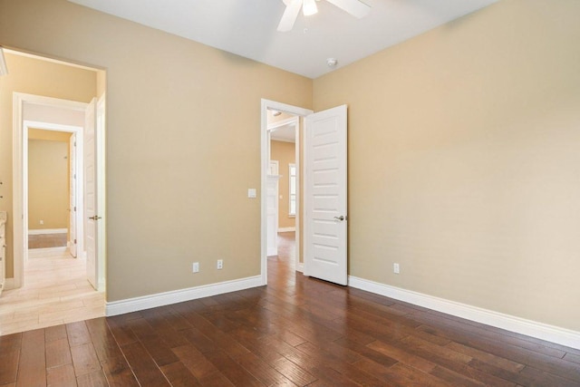 124 Abamillo Dr, Bastrop, TX 78602 - empty room featuring ceiling fan and dark wood-style flooring