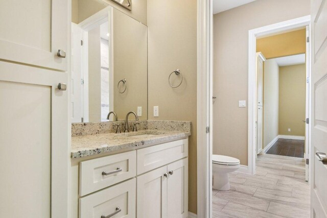 124 Abamillo Dr, Bastrop, TX 78602 - bathroom featuring toilet and vanity