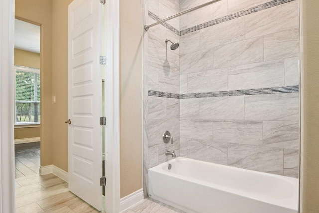 124 Abamillo Dr, Bastrop, TX 78602 - bathroom with shower / bath combination and baseboards