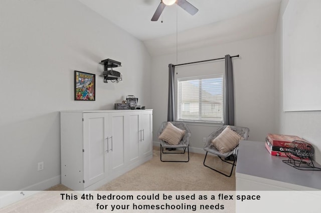 sitting room featuring lofted ceiling, light carpet, and ceiling fan