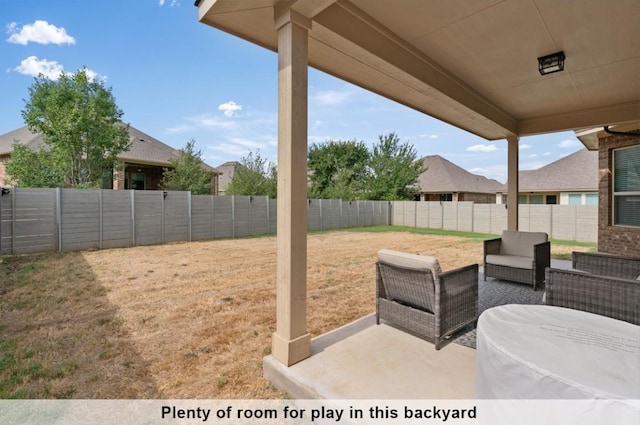 view of yard with a patio area and outdoor lounge area