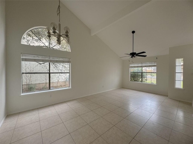 unfurnished room with beamed ceiling, light tile patterned flooring, ceiling fan with notable chandelier, and high vaulted ceiling