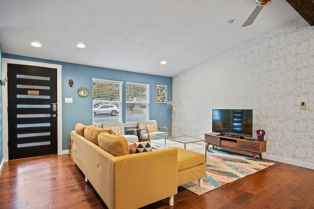 living room with lofted ceiling and wood-type flooring