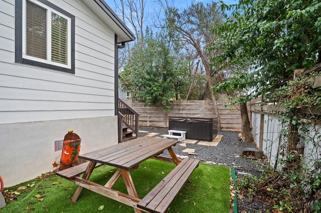 view of patio featuring a hot tub