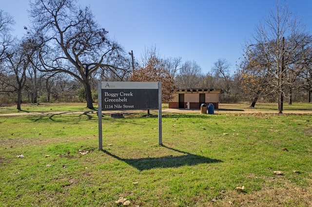 view of community with a yard