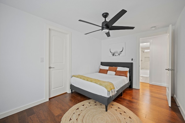 bedroom featuring ceiling fan and dark hardwood / wood-style floors