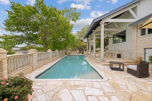 view of swimming pool featuring a patio area