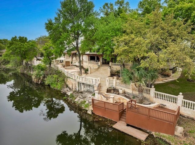 exterior space with a water view