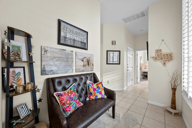 living area with light tile patterned floors