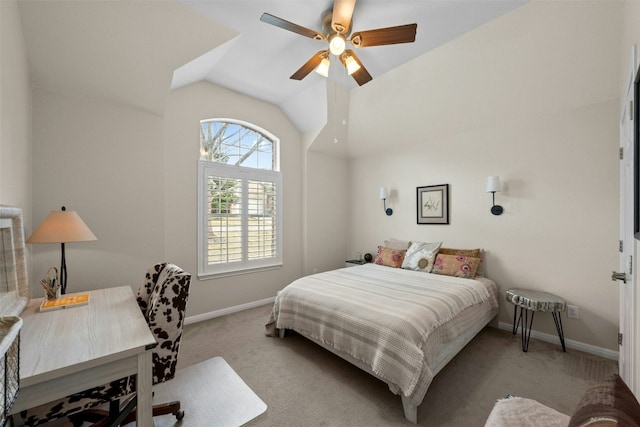 bedroom featuring ceiling fan, light colored carpet, and lofted ceiling