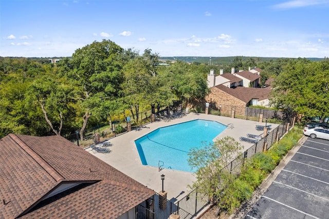 view of swimming pool with a patio