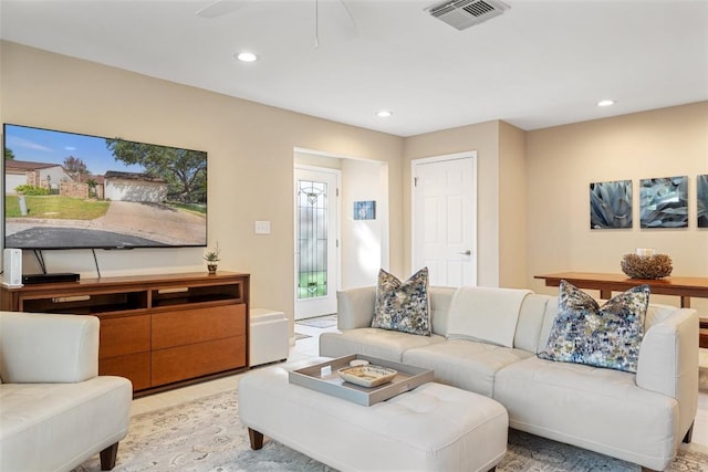 living room with light tile patterned floors