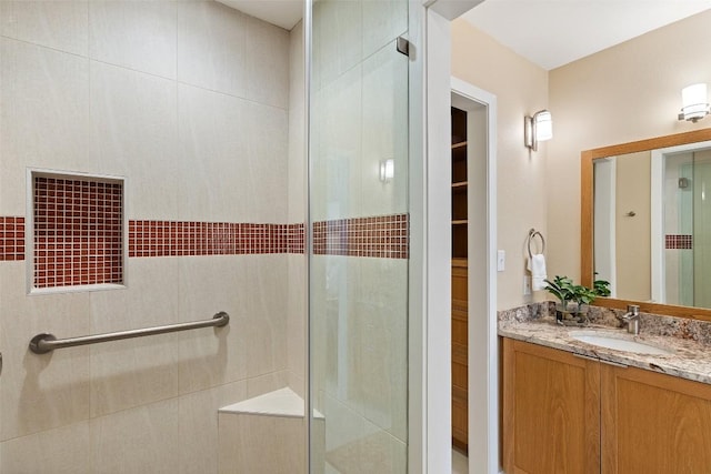 bathroom featuring vanity and walk in shower