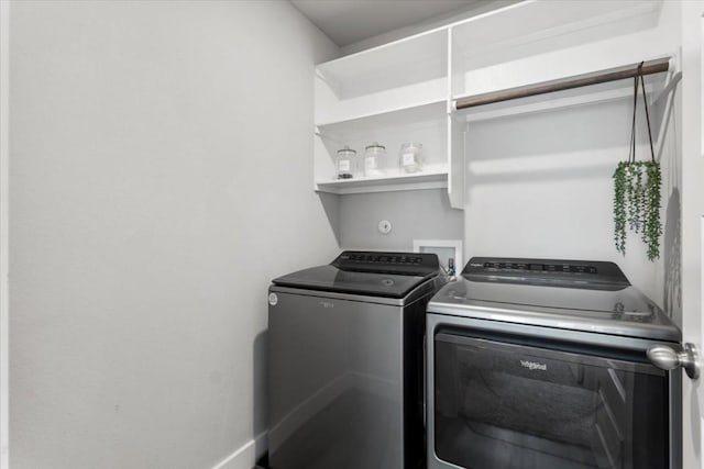 washroom with separate washer and dryer