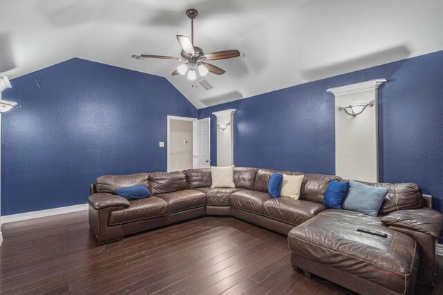 living room featuring a ceiling fan, vaulted ceiling, wood finished floors, and visible vents