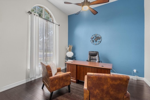 office area featuring dark wood-style floors, ceiling fan, and baseboards