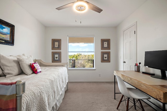 bedroom with light colored carpet and ceiling fan